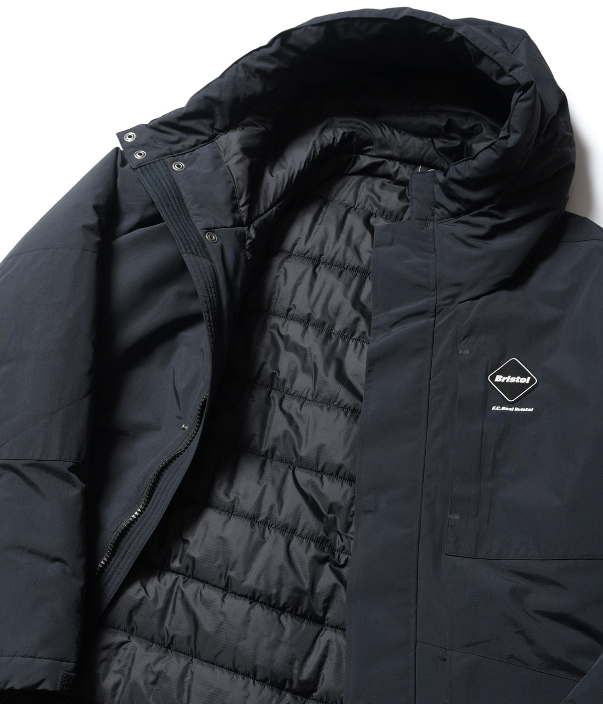 Bristol DOWN BENCH COAT FCRB ダウン ブラック F.C.Real Bristol（エフシーレアルブリストル）の「DOWN BENCH