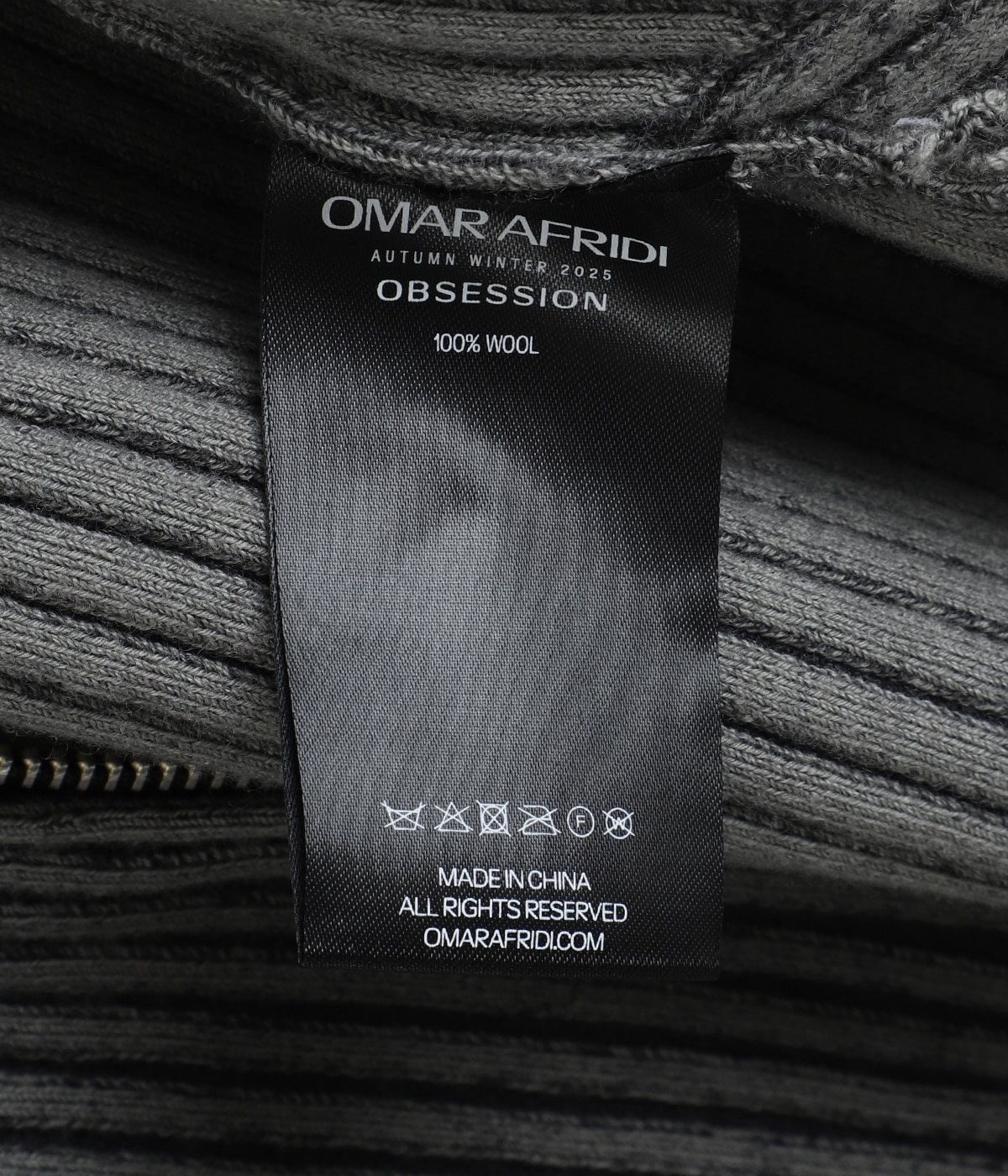 ARTICULATED DRIVERS KNIT SWEATER | Omar Afridi(オマールアフリディ